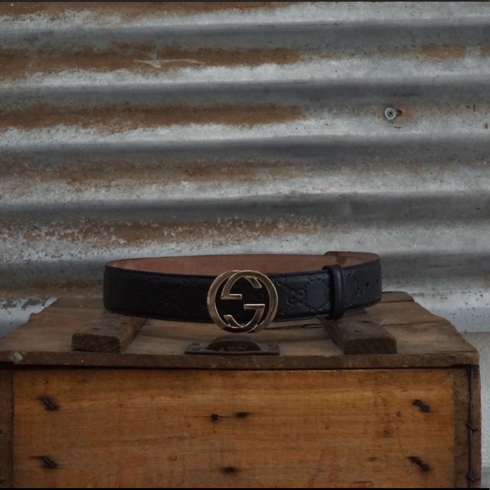 Black and Gold traditional monogram Gucci belt.
